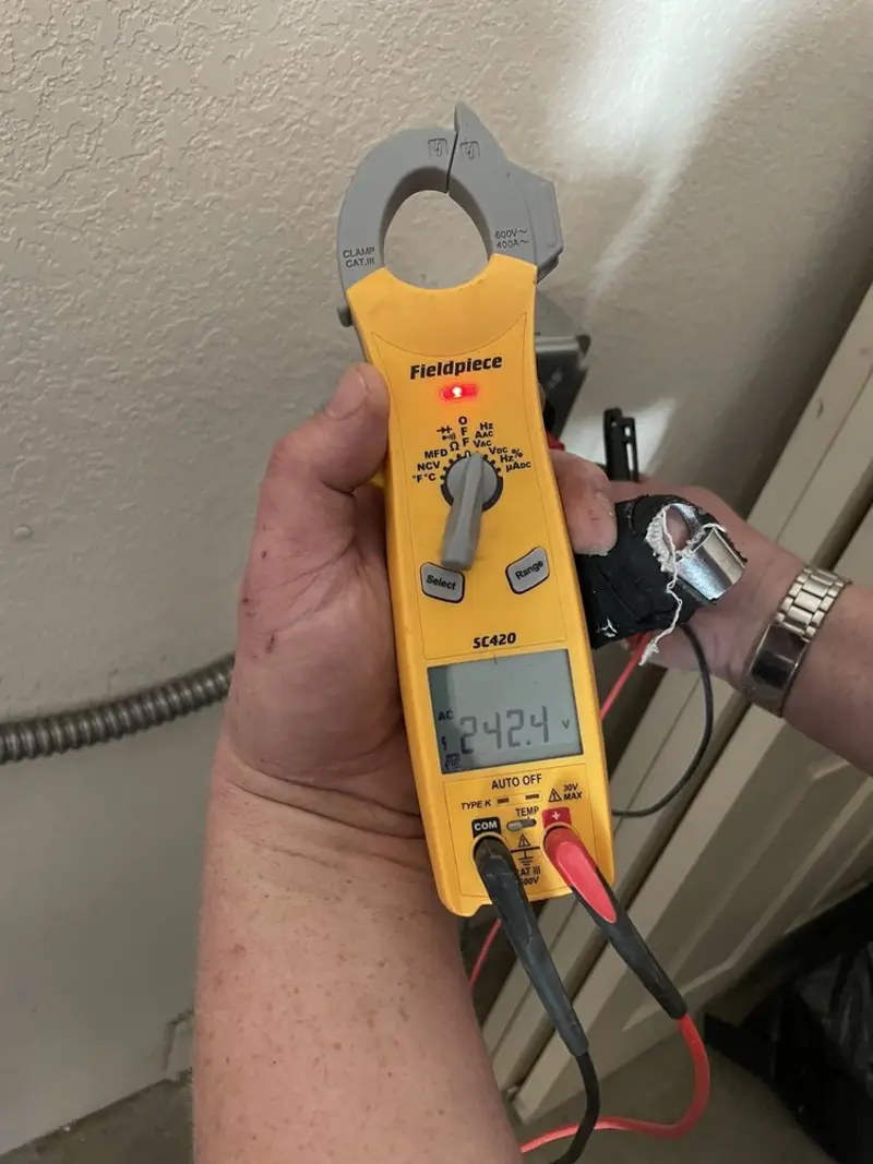 Voltage testing with clamp meter during Generator Installation in Sunapee